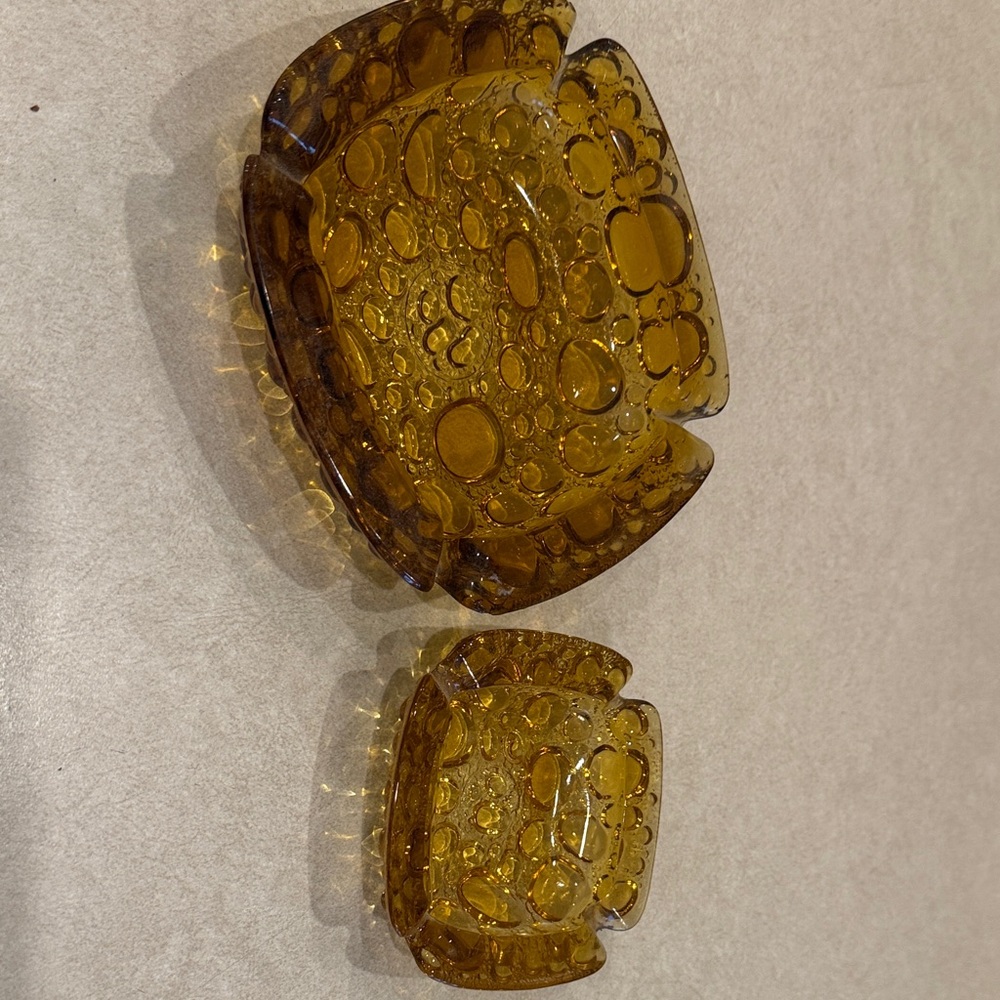 Mid-century, modern Amber Glass Pebble Ashtray Set.